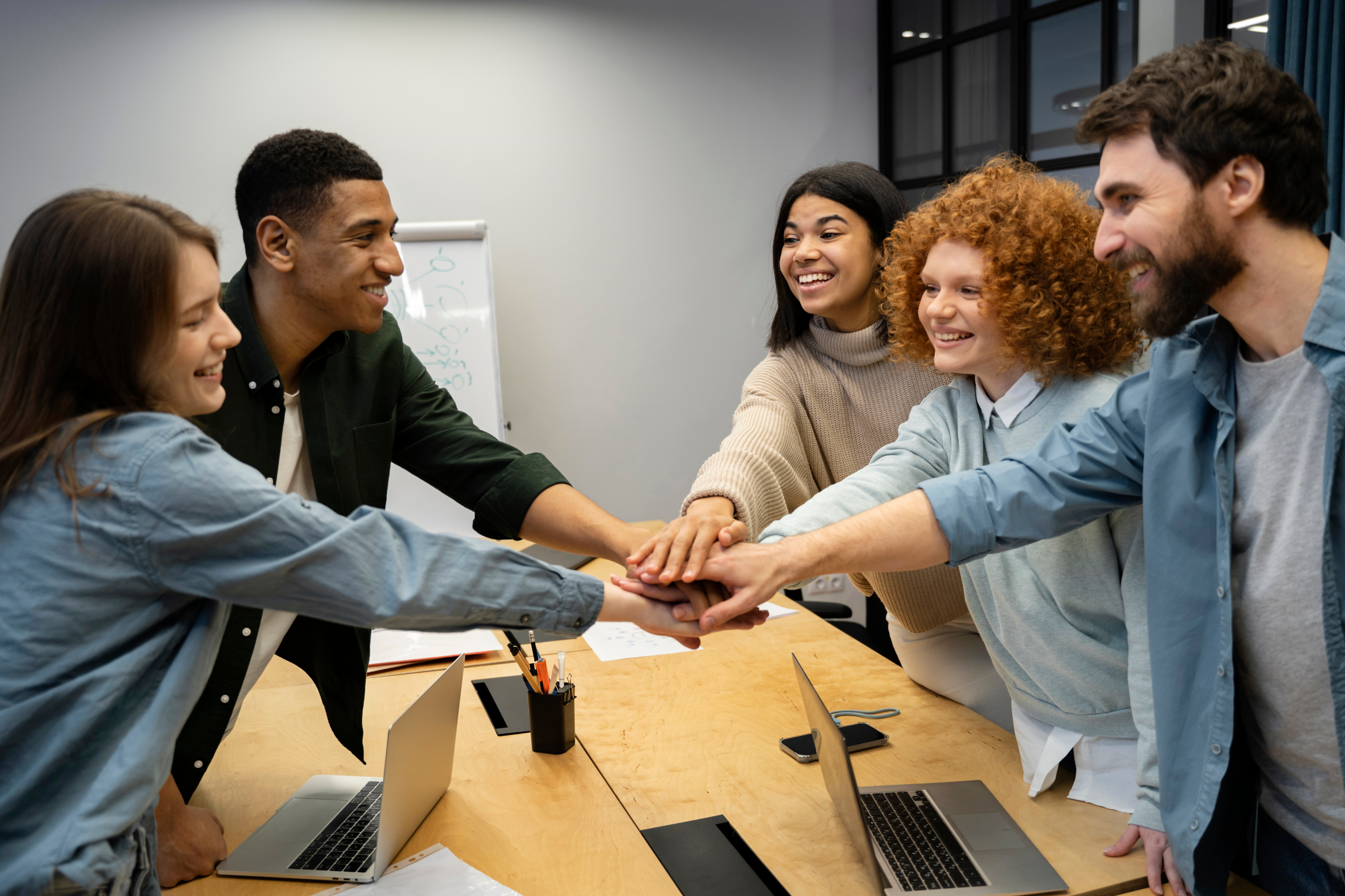 Team collaboration hands together